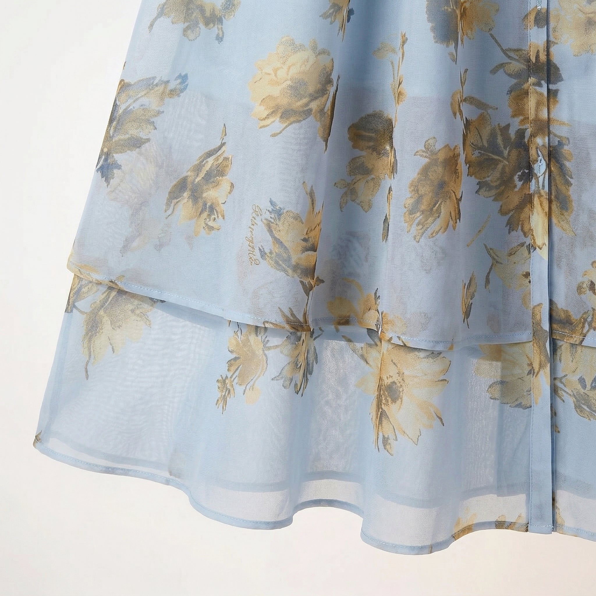 9630 Vestido Azul Celeste con Flores Doradas y Cinturón Manga Larga Transparencia Suave